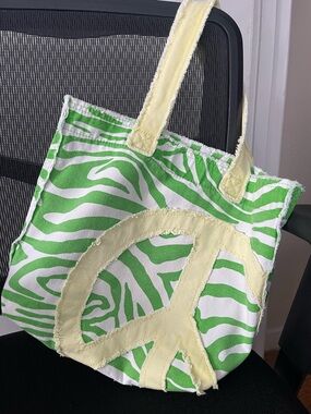 Green Zebra Print Canvas Tote Bag with Yellow Peace Sign and velcro close.